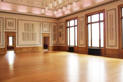 The Ballroom viewed from the entrance, showing the full wood-columned room
